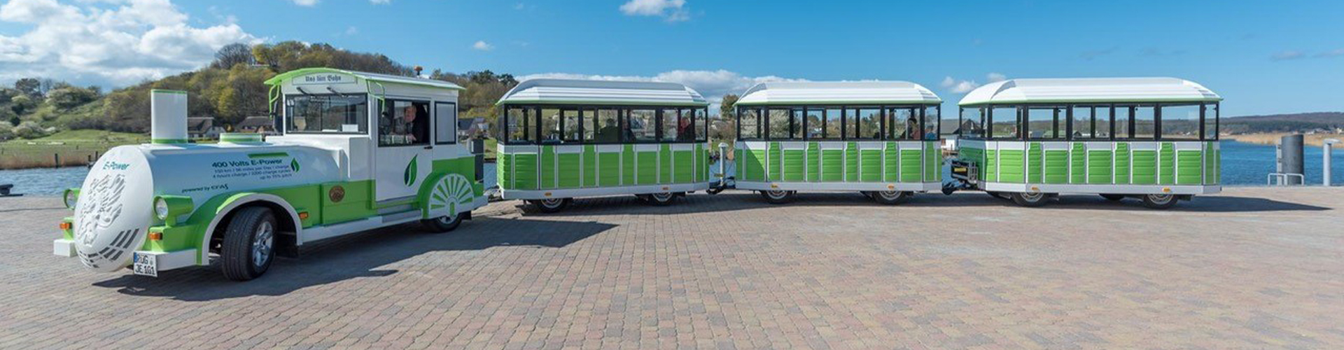 GREIF-EXPRESS-Bimmelbahn-vor-seinem-Tourstart - © Jagdschlossexpress und Ausflugsfahrten GmbH
